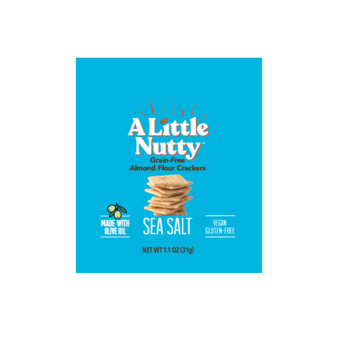 Box of 'A Little Nutty' sea salt crackers on a blue background