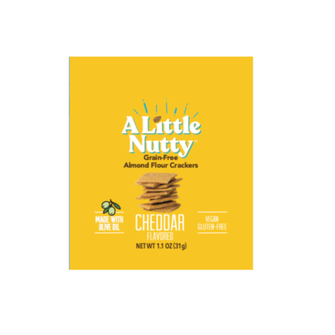 Yellow packaging of 'A Little Nutty' grain-free almond flour crackers with cheddar flavor on a white background.