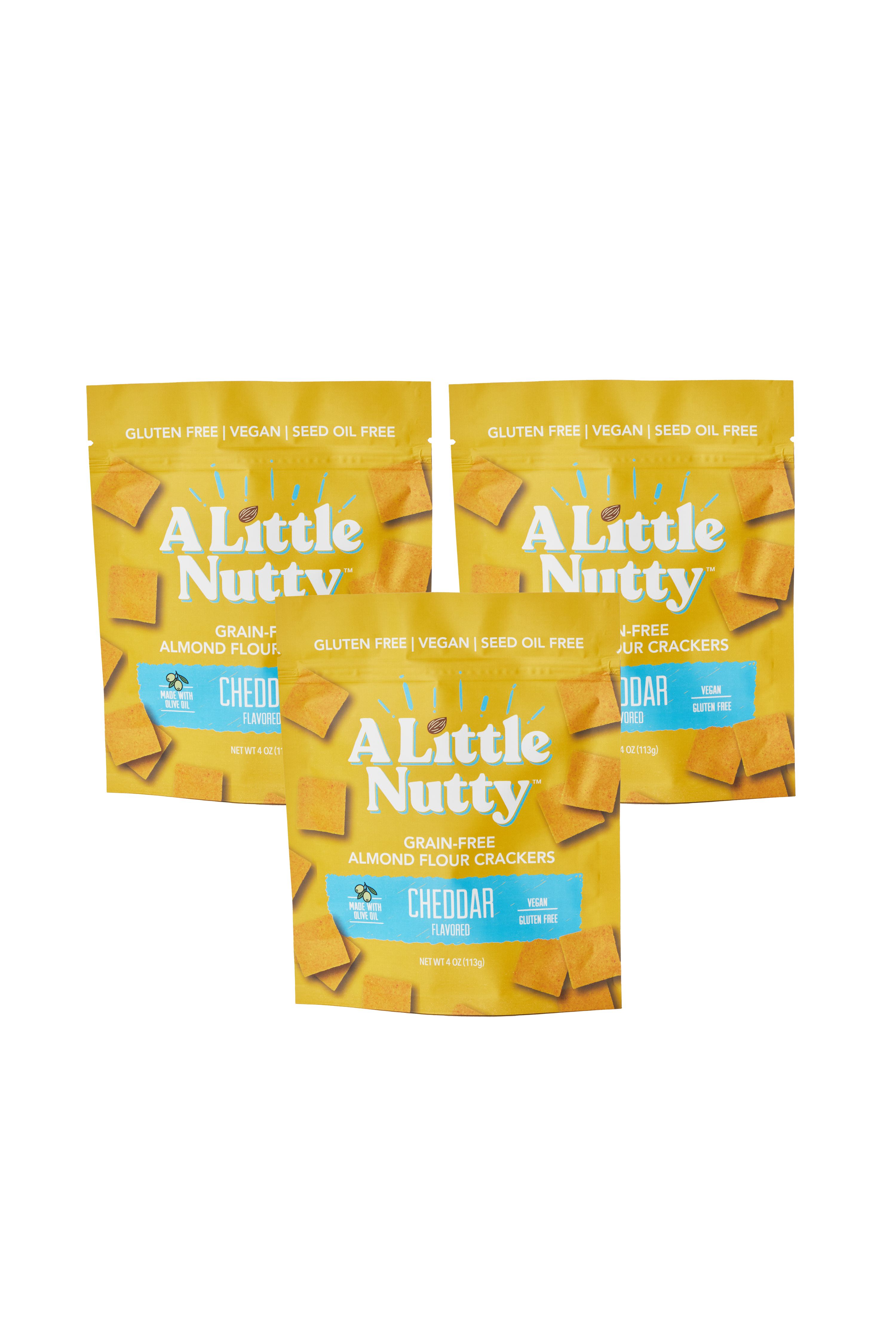 Three packages of 'A Little Nutty' snack crackers on a white background